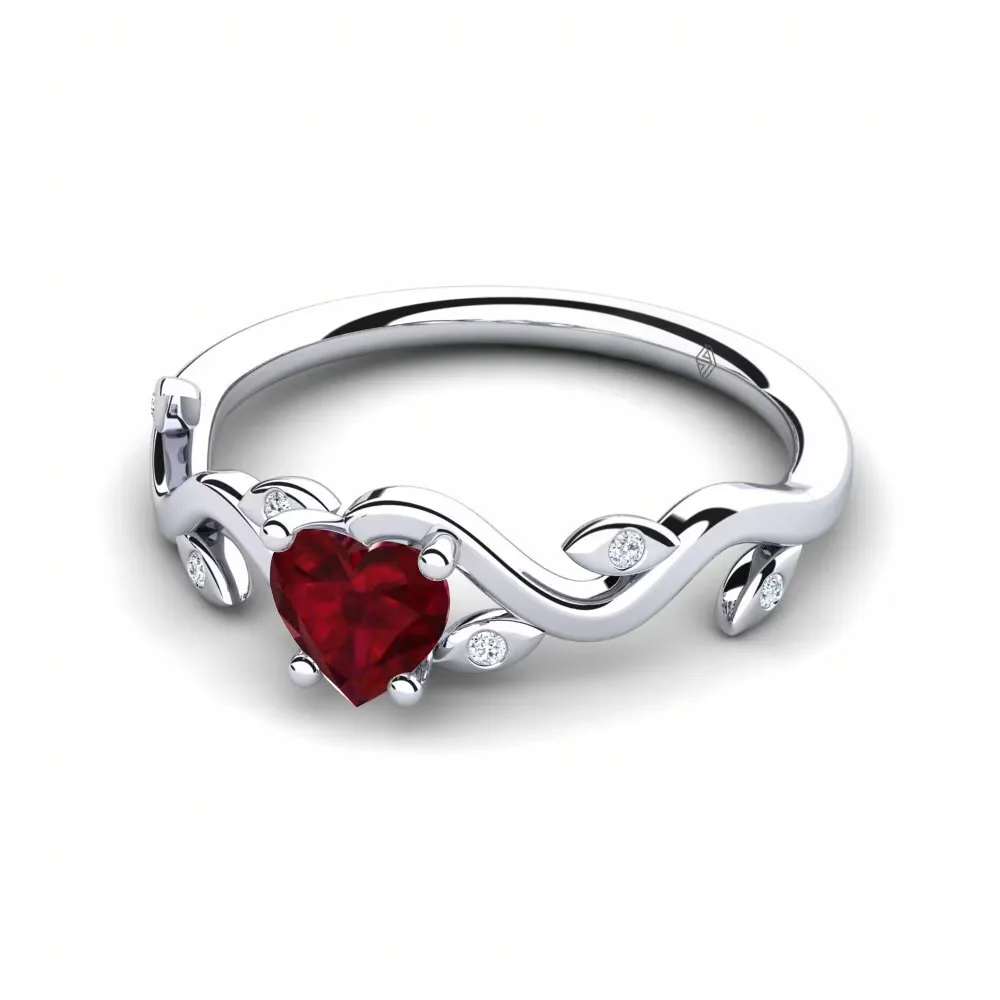 Heart shaped ruby ring with diamond accents