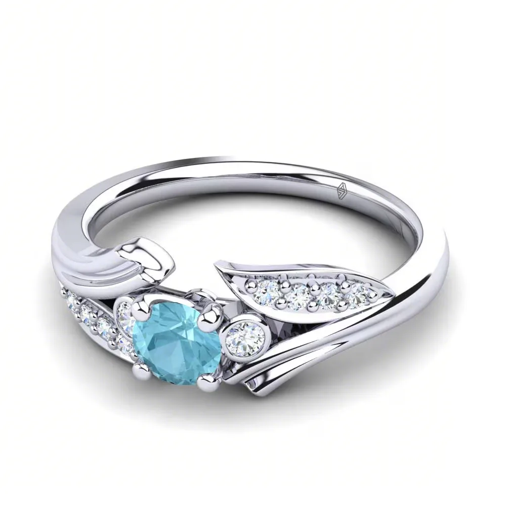 Blue sapphire ring with diamond halo