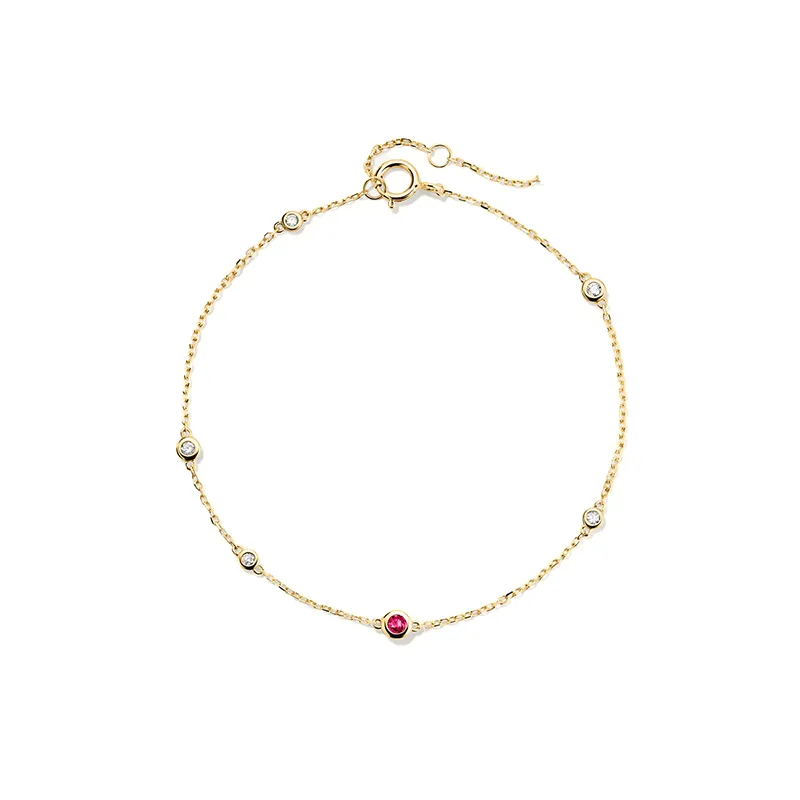 Alternating ruby and diamond gold bracelet