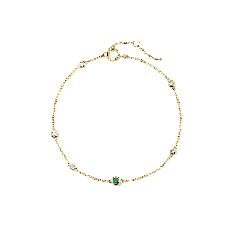 Alternating emerald and diamond bracelet gold
