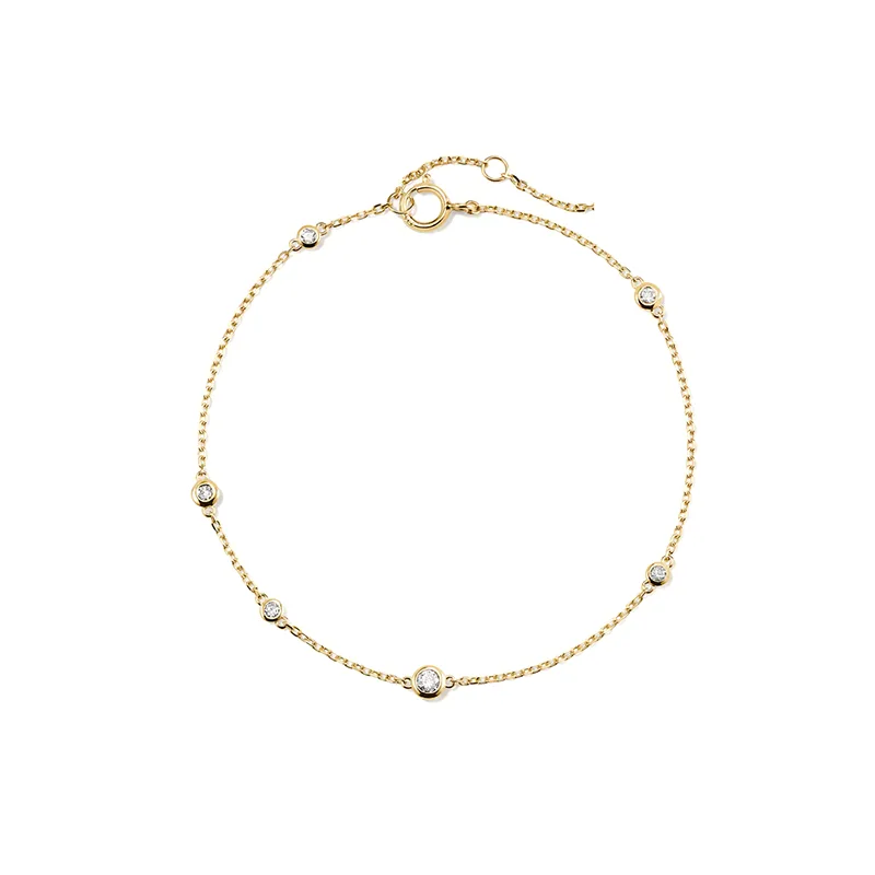 Gold chain bracelet with six round lab diamonds
