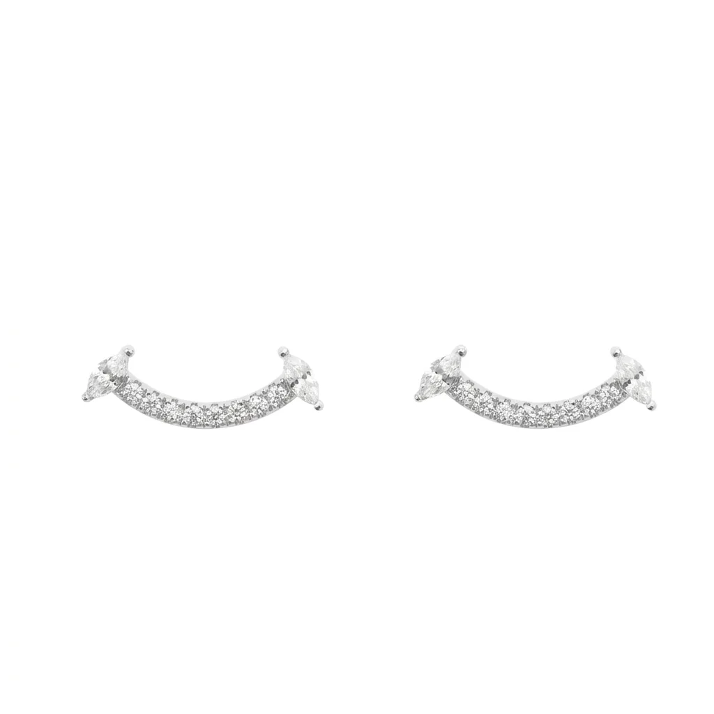 Boucles sourire lumineux, bijoux d'oreilles joyeux et brillants